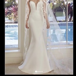 Ivory, satin, strapless sweetheart neckline. US 10